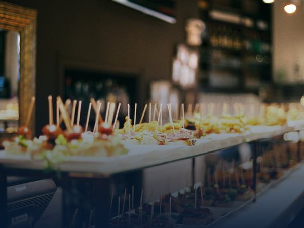 Catering buffet with appetizers, kept cold with bagged ice and on-site storage